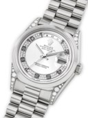 ROLEX. AN ATTRACTIVE PLATINUM AND DIAMOND-SET AUTOMATIC BRACELET WATCH WITH SWEEP CENTRE SECONDS, CHINESE DAY AND DATE