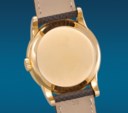 PATEK PHILIPPE. AN EXCEPTIONALLY RARE AND HIGHLY ATTRACTIVE 18K PINK GOLD PERPETUAL CALENDAR WRISTWATCH WITH SWEEP CENTRE SECONDS AND MOON PHASES