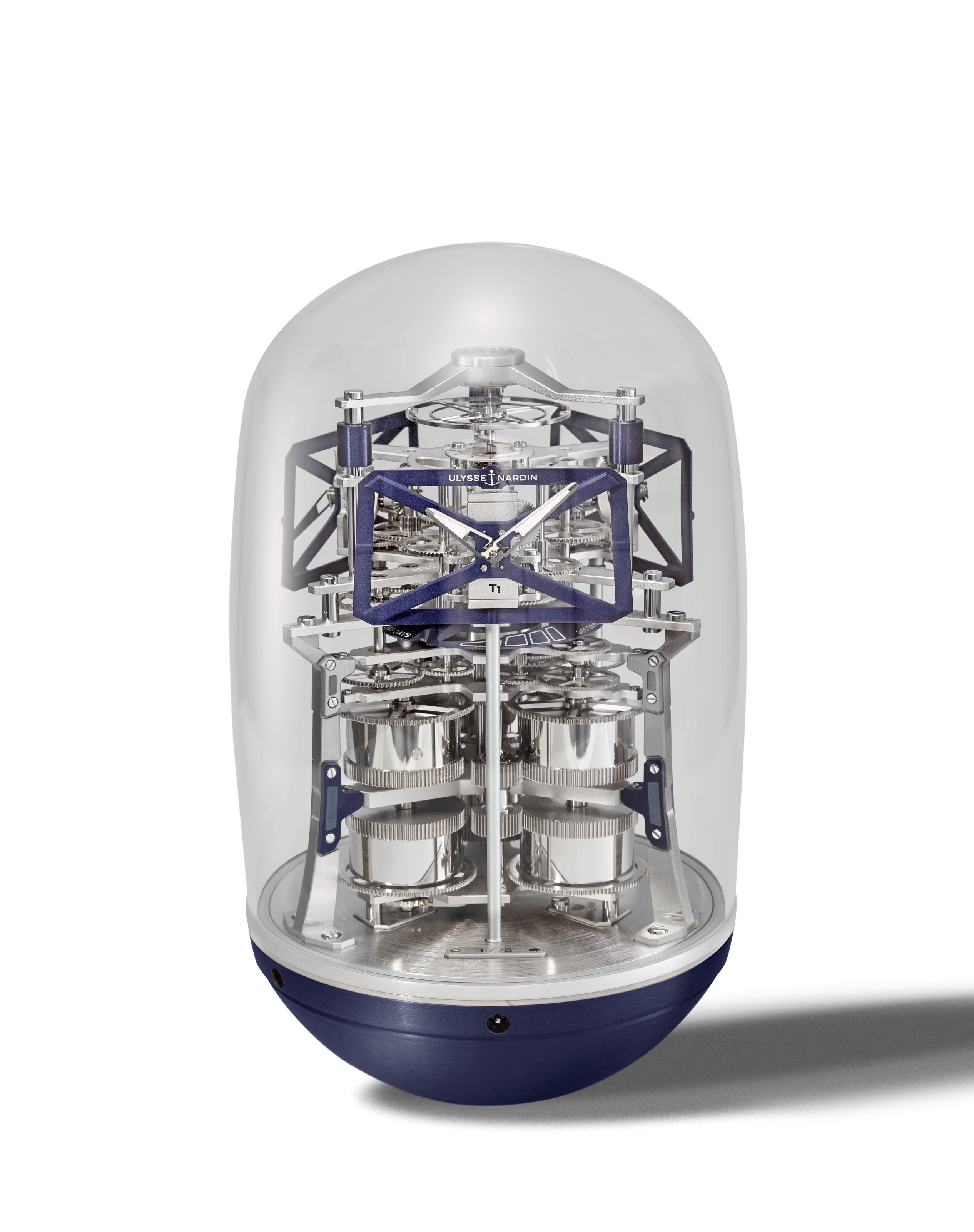 ULYSSE NARDIN. A VERY RARE AND UNUSUAL ALUMINIUM AND BLOWN GLASS LIMITED EDITION SCULPTURAL TRIPLE TIME ZONE TABLE CLOCK WITH ONE-YEAR POWER RESERVE