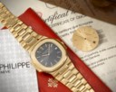 PATEK PHILIPPE. A RARE AND ICONIC 18K GOLD AUTOMATIC WRISTWATCH WITH DATE AND BRACELET