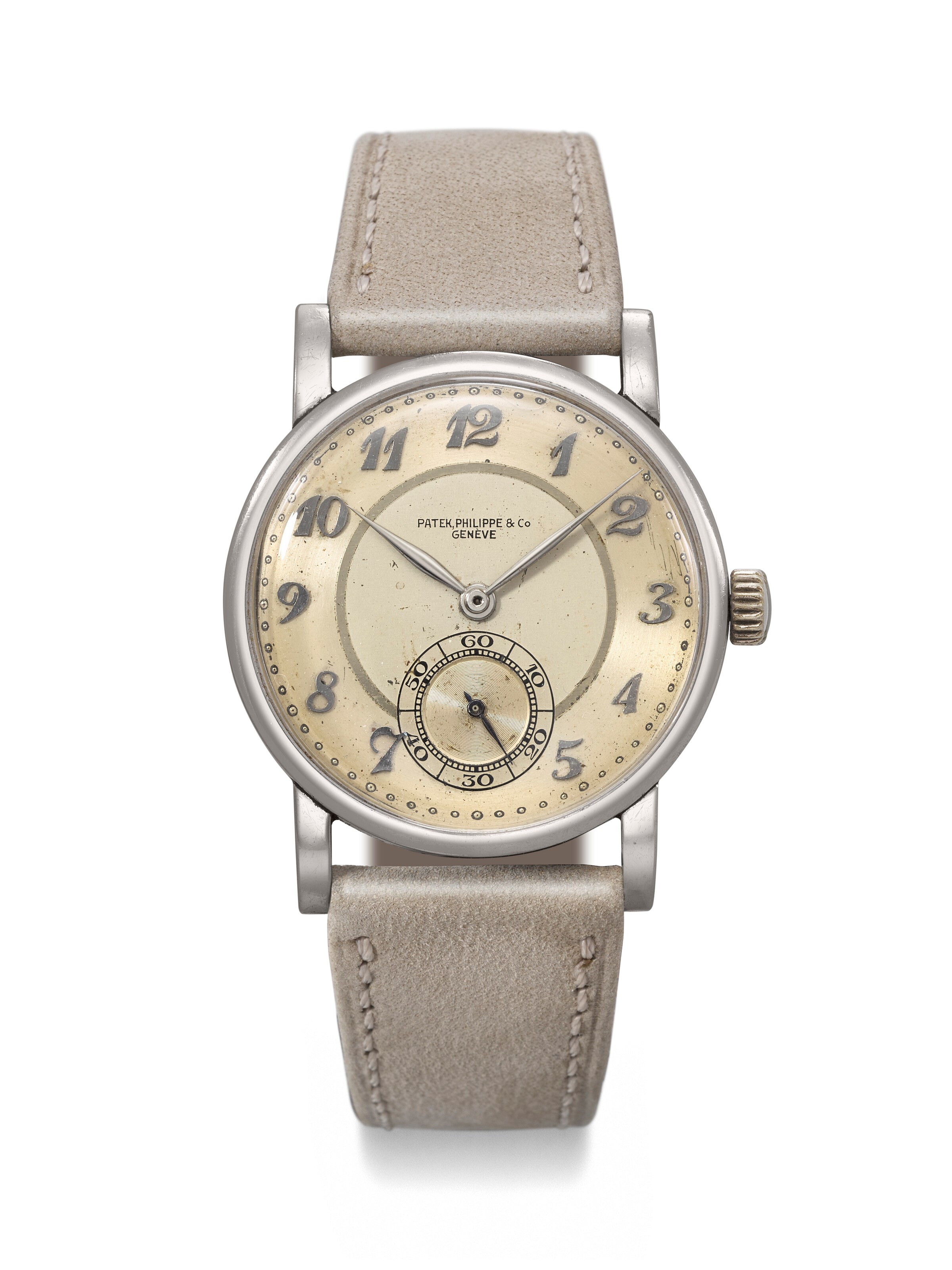 PATEK PHILIPPE. AN EXTREMELY RARE AND HIGHLY ATTRACTIVE STAINLESS STEEL WRISTWATCH WITH THREE-TONE DIAL AND BREGUET NUMERALS