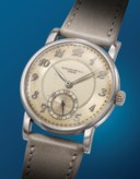 PATEK PHILIPPE. AN EXTREMELY RARE AND HIGHLY ATTRACTIVE STAINLESS STEEL WRISTWATCH WITH THREE-TONE DIAL AND BREGUET NUMERALS