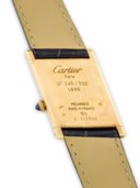 CARTIER. AN UNUSUAL 18K GOLD LIMITED EDITION WRISTWATCH