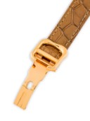 CARTIER. AN ATTRACTIVE AND VERY RARE 18K PINK GOLD LIMITED EDITION SKELETONISED ASYMMETRICAL WRISTWATCH