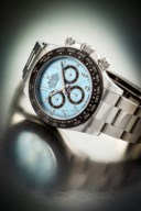 ROLEX. A RARE PLATINUM AUTOMATIC CHRONOGRAPH WRISTWATCH WITH BRACELET AND EASTERN ARABIC NUMERALS
