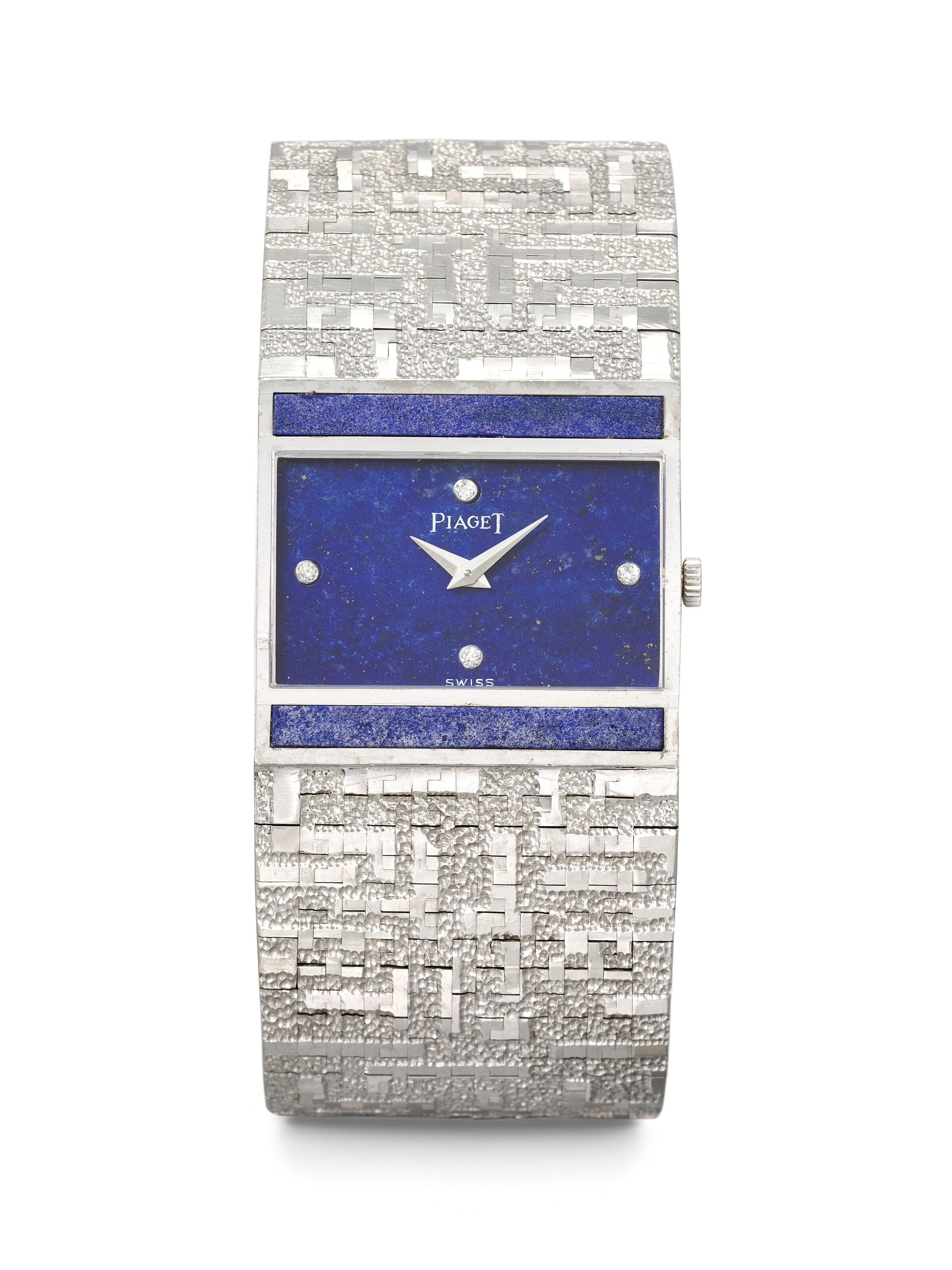 PIAGET. A RARE AND UNUSUAL 18K WHITE GOLD AND DIAMOND-SET BRACELET WATCH WITH LAPIS LAZULI DIAL