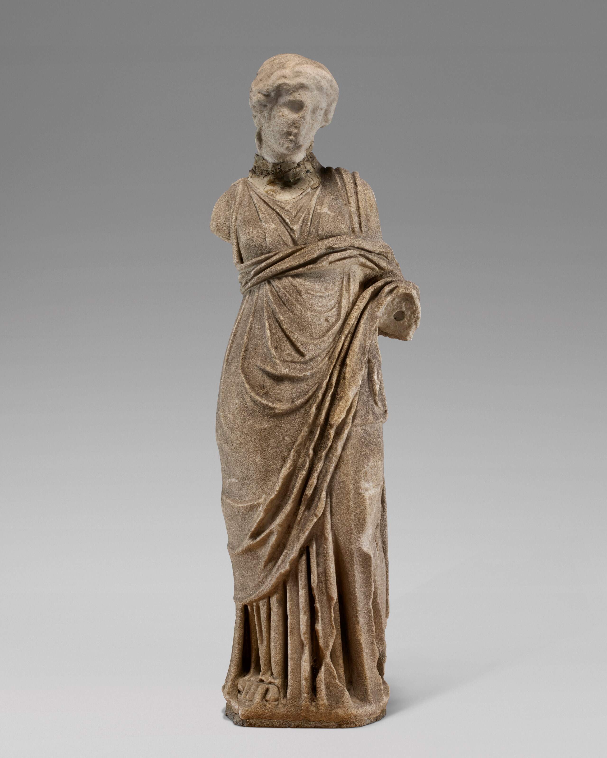 A ROMAN MARBLE DRAPED GODDESS