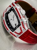 RICHARD MILLE. A  LADY’S UNIQUE, IMPRESSIVE AND ATTRACTIVE PLATINUM, DIAMOND AND RUBY-SET AUTOMATIC SEMI-SKELETONISED WRISTWATCH WITH DATE