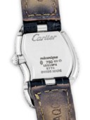 CARTIER. A RARE 18K WHITE GOLD AND DIAMOND-SET ASYMMETRICAL WRISTWATCH