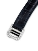 CARTIER. A RARE 18K WHITE GOLD AND DIAMOND-SET ASYMMETRICAL WRISTWATCH
