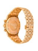AUDEMARS PIGUET. A FIRST-OF-ITS-KIND AND DAZZLING 18K PINK GOLD, BAGUETTE-CUT RUBY AND DIAMOND-SET AUTOMATIC CHRONOGRAPH WRISTWATCH WITH DATE AND BRACELET, MADE FOR THE RETAILER DOBNER