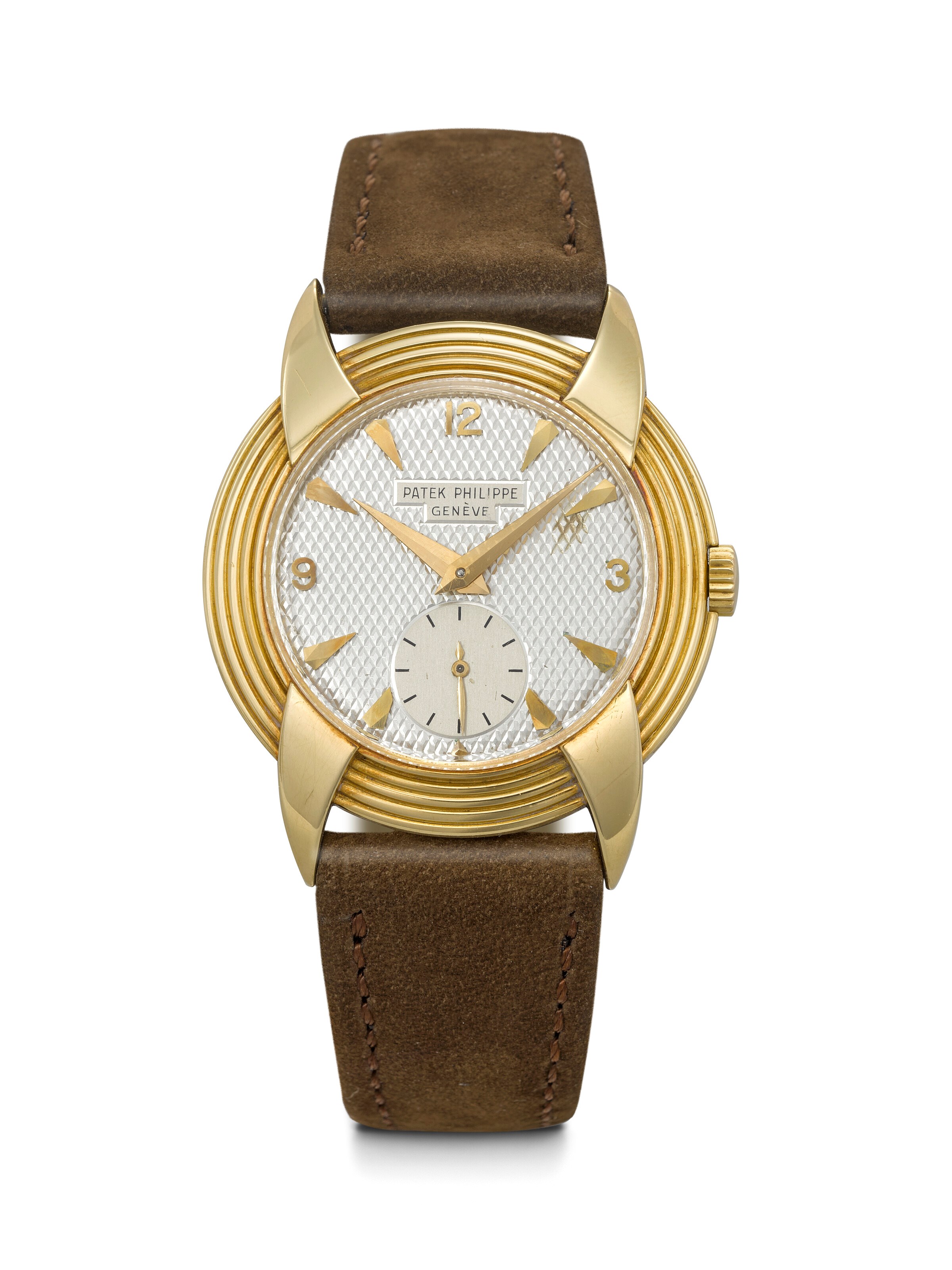 PATEK PHILIPPE. A HIGHLY UNUSUAL AND ATTRACTIVE 18K GOLD WRISTWATCH WITH FANCY LUGS