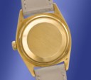 ROLEX. A VERY RARE AND HIGHLY ATTRACTIVE 18K GOLD AUTOMATIC WRISTWATCH WITH SWEEP CENTER SECONDS, DAY, DATE AND GREEN LACQUERED 'STELLA' DIAL