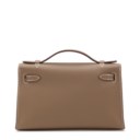 AN ÉTOUPE SWIFT LEATHER KELLY POCHETTE WITH GOLD HARDWARE