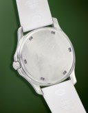 PATEK PHILIPPE. AN ATTRACTIVE AND SPORTY STAINLESS STEEL AND DIAMOND-SET QUARTZ WRISTWATCH WITH DATE