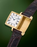 CARTIER. AN EXTREMELY RARE AND ELEGANT DUAL TIME REVERSIBLE WRISTWATCH WITH GOLD AND WHITE DIALS