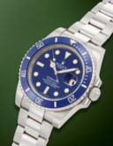 ROLEX. A SPORTY AND HEAVY 18K WHITE GOLD AUTOMATIC WRISTWATCH WITH SWEEP CENTER SECONDS, DATE AND BRACELET