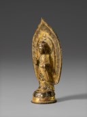 A GILT-BRONZE FIGURE OF STANDING AMITHABA