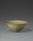 A MOLDED YAOZHOU CELADON 'FLORAL SCROLL' BOWL
