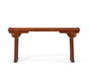 A RARE HUANGHUALI TRESTLE-LEG TABLE