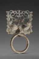 A BRONZE TAOTIE MASK AND RING HANDLE