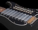 A SOLID-BODY ELECTRIC GUITAR, STRATOCASTER