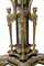 AN ENGLISH SILVER AND SILVER-GILT ELECTROPLATED AND ENAMEL-MOUNTED EBONY AND IVORY CHESS-TABLE WITH SILVER-GILT AND ENAMELLED CHESS-SET 
