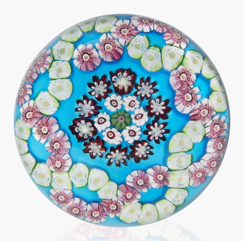 A Clichy patterned millefiori colour-ground weight, mid-19th century. 3⅛ in (8 cm) diameter. Sold for $5,000 on 20 Apr 2016, Online