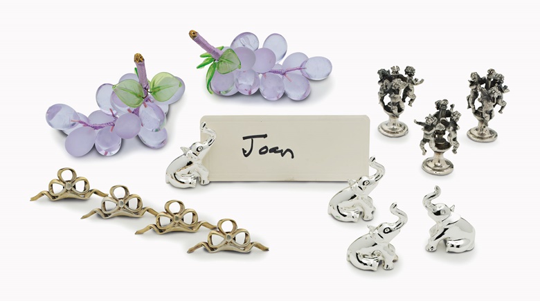 A group of silver, silvered-metal and coloured glass placeholders, 20th century. Estimate $1,500-2,500. This lot is offered in the Private Collection of Joan Rivers sale on 22 June at Christies New York