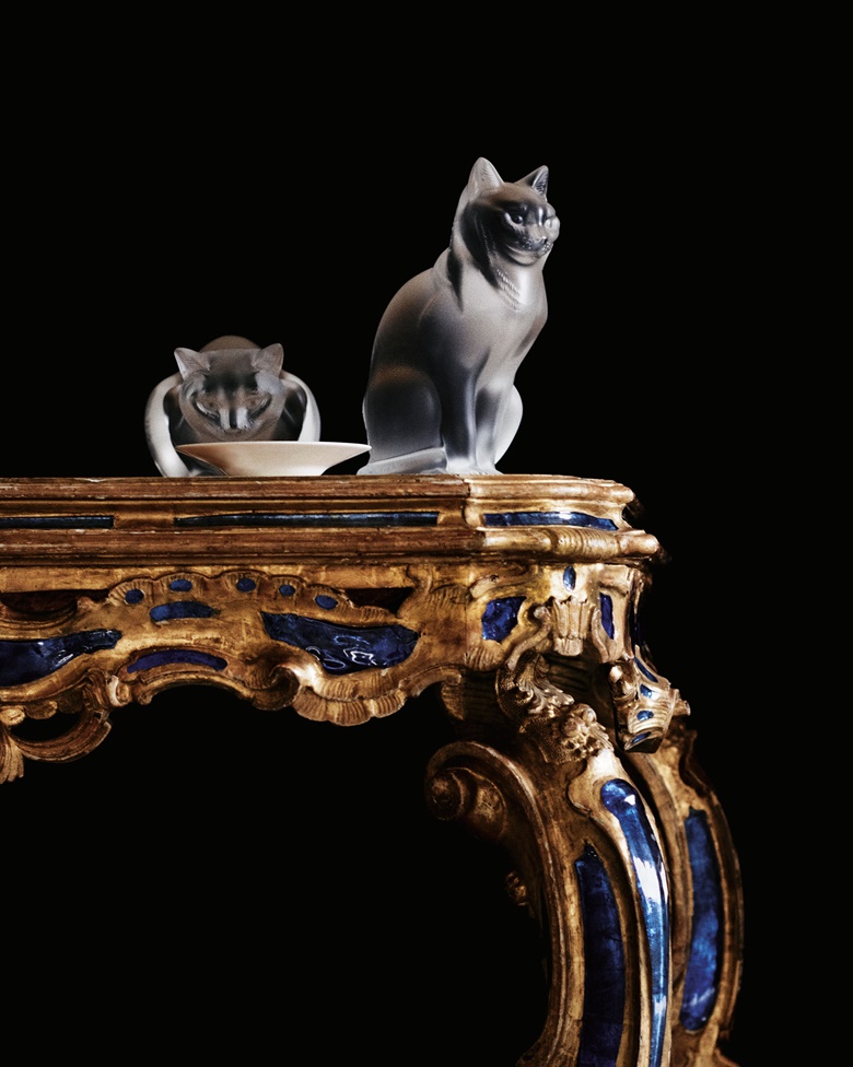 Three French frosted-glass animals and birds. Signed in etch Lalique France, 20th century. 11¾ in. (29.8 cm.) high, the tallest. Estimate $1,000-1,500; A pair of north Italian blue-glass-inset giltwood console tables. Venice, late 18th century. 33½ in. (85.1 cm.) high, 41½ in. (105.4 cm.) wide, 21½ in. (54.6 cm.) deep. Estimate $70,000-100,000. This lot is offered in