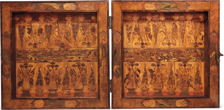 A Bohemian silver-mounted relief-carved fruitwood marquetry and walnut folding games box. By Adam Eck, Eger, signed and dated 1664. 6½ in (16.5 cm) high; 18¾ in (48 cm) square (closed). Estimate £70,000-100,000. This lot is offered in The Exceptional Sale 2016 on 7 July 2016 at Christie’s in London, King Street