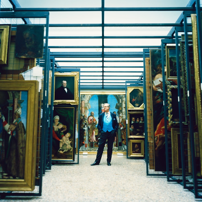 James Bradburne at the Pinacoteca di Brera, with unhung artworks displayed on racks. Photograph by Alberto Zanetti
