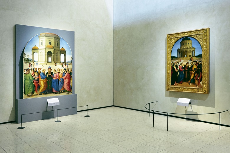 One of the museum’s masterpieces, Raphael’s Marriage of the Virgin (right), hanging next to Perugino’s version, on loan from France. Photograph by Alberto Zanetti