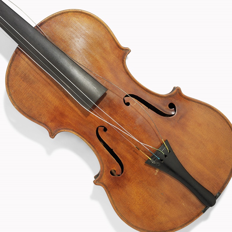 A violin owned by Charlie Chaplin and probably played in the film The Vagabond. German, late 19th century. The interior with a handwritten label inscribed ‘To my dear friend Charlie Chaplin (who by much suffering attained to great wisdom and feeling) from your admirer Cecil E. Reynolds. Los Angeles. & Fby. 1917. This lot is offered in the Out of the Ordinary sale on 14 September at