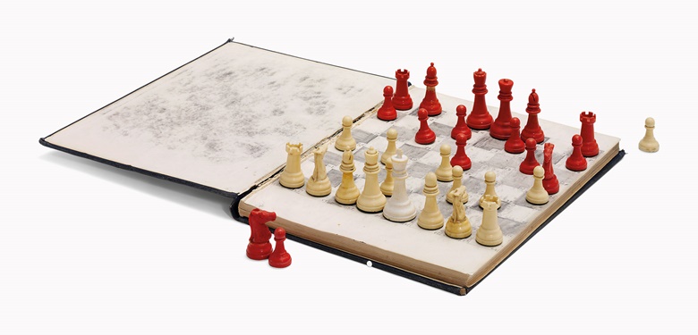 Robert Franklin Stroud, ‘The Birdman of Alcatraz’ (1890-1963). A chess set and hand-drawn board, circa 1945, together with a copy of the ‘Atlas of Avian Anatomy’ by Frank Wilbert Chamberlain, Michigan, 1943. Estimate £3,000-5,000. This lot is offered in the Out of the Ordinary sale on 14 September at Christies South Kensington. 