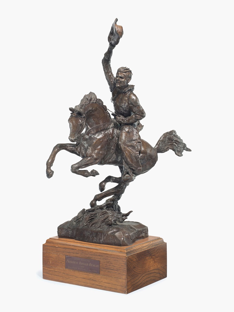 Marshall Jackson, President Reagan on Horseback, 20th Century. Signed with initials and numbered 515 © MJ and inscribed with symbol (on the edge of base). Bronze with brown patina. 21 x 8½ x 17 in (53.3 x 21.6 x 43.2 cm), not including base. Estimate $1,000-1,500. This lot will be offered in The Private Collection of President and Mrs. Ronald Reagan, 21-22 September at Christies