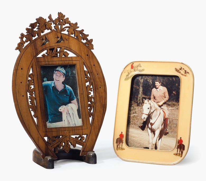 President Ronald Reagan, a carved wood horse-shoe photograph frame, 20th century. 12½ in (32 cm) high, 8¼ in (21 cm) wide. Estimate $300-500. This lot is offered in the Private Collection of President and Mrs. Ronald Reagan Online Auction, 19-28 September