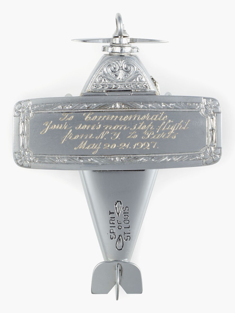 Milos & Diel Watch Case Company. A Fine, Historically Important and Unique 14k White Gold Model Airplane-form Watch Made for the Mother of American Aviator Charles Lindbergh. Sold for $35,000 on 7 June 2016