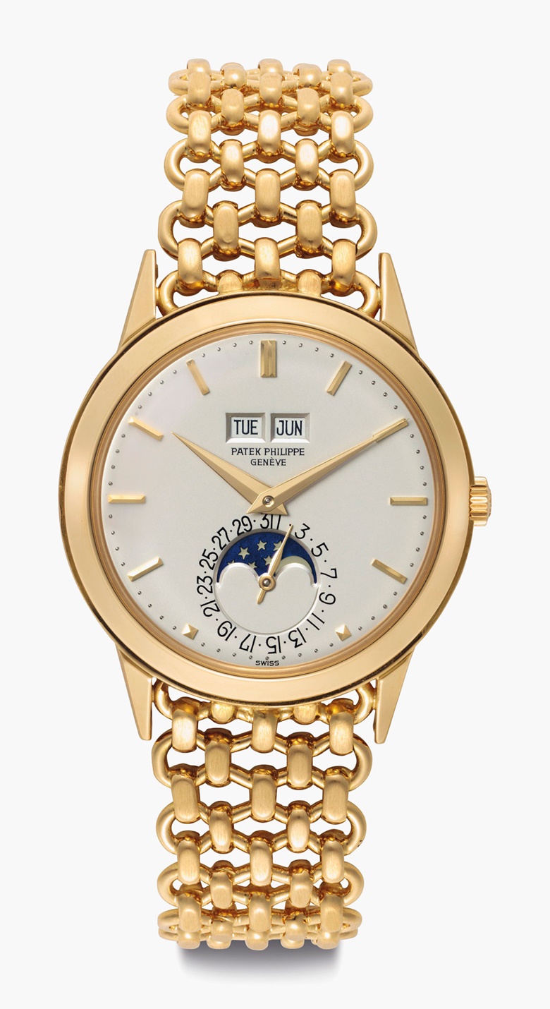 Patek Philippe. An Extremely Fine and Rare 18k-Gold Automatic Perpetual Calendar Wristwatch with Moon Phases and Bracelet. Sold for $100,000 on 7 June 2016