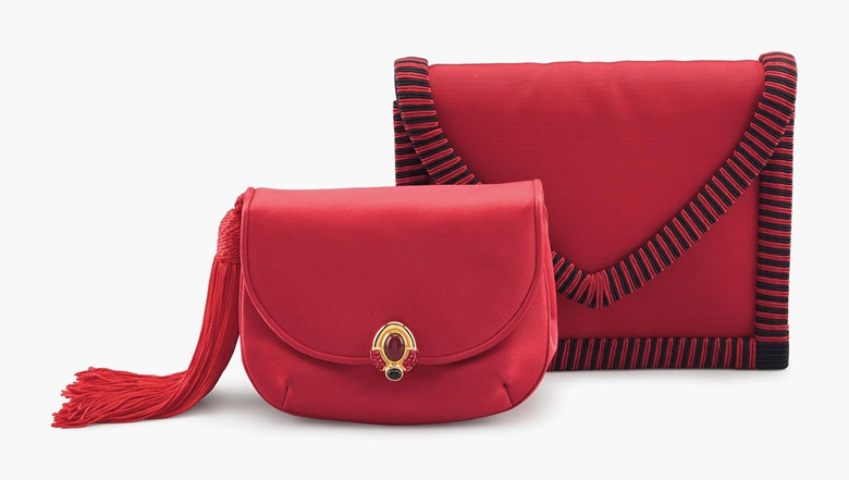 A red satin tassel boroso clutch bag with cabochon and a red and black grosgrain envelope clutch bag, Judith Leiber and Yves Saint Laurent. Estimate $400-600. This lot will be offered in The Private Collection of President and Mrs. Ronald Reagan, 21-22 September at Christies in New York