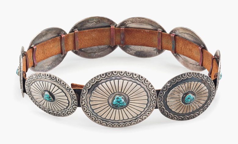 A silver and turquoise Navajo concho belt, C.M. Yazzie. Estimate $200-300. This lot is offered in the Private Collection of President and Mrs. Ronald Reagan Online Auction, 19-28 September