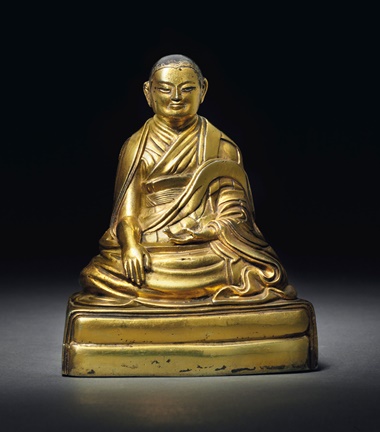 A gilt silver figure of the Sixth Shamarpa, Mipan Chokyi Wangchug (1584–1630). Tibet, 17th century. 3¾ in (9.4 cm) high.
