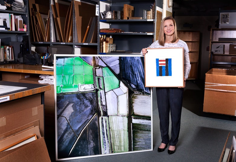 Anne Bracegirdle, Photographs specialist, holds Untitled, 1982, by Sean Scully, alongside David Maisel’s Terminal Mirage 5, created in 2003