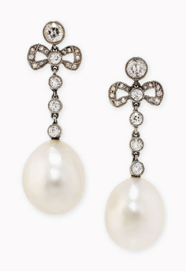 A pair of Belle Epoque natural pearl and diamond ear pendants. Sold for £60,000 on 30 November 2016 at Christie’s London 