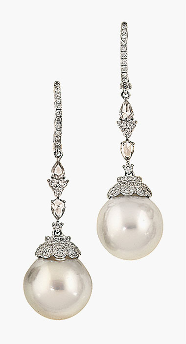 A pair of cultured pearl and diamond earrings. Sold for £1,750 on 21 January 2015 at Christie’s South Kensington 