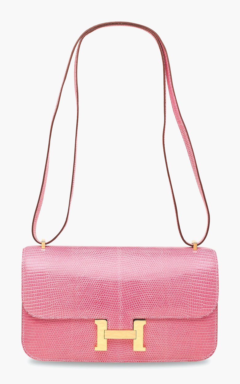 A shiny pink 5P Salvator Lizard Constance Èlan with gold hardware. Hermès 2010. Estimate HK$80,000-100,000  $11,000-13,000. This lot is offered in Handbags & Accessories  on 31 May 2017 at Christie’s in Hong Kong