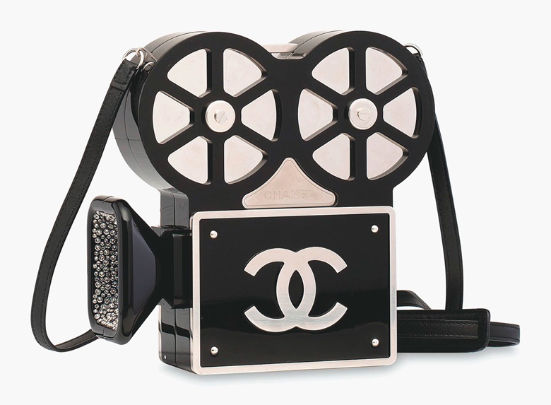 A rare, black Paris-Rome movie camera evening bag with crystals, Chanel 2016. Estimate $100,000-150,000  $13,000-19,000. This lot is offered in Handbags & Accessories  on 31 May 2017 at Christie’s in Hong Kong