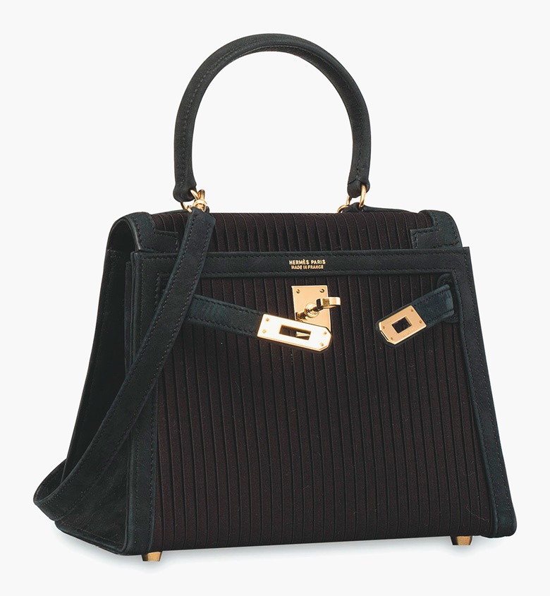 A Bleu Marine ribbed satin Mini Sellier Kelly 20 with gold hardware, Hermès 1991. Estimate HK$80,000-100,000  $11,000-13,000. This lot is offered in Handbags & Accessories  on 31 May 2017 at Christie’s in Hong Kong