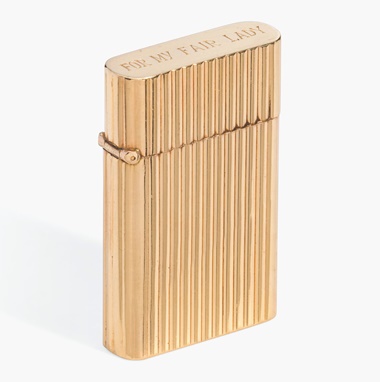My Fair Lady, 1964Gene Allen
a Cigarette Lighter. 2  in (5  cm) long. Estimate £3,000-5,000. This lot is offered in Audrey Hepburn The Personal Collection on 27 September 2017  at Christie’s in London