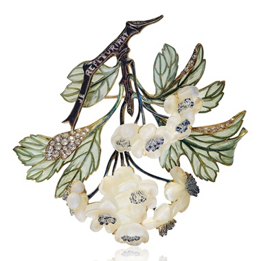 An Art Nouveau diamond, enamel and glass Hawthorn brooch, by René Lalique, 1899-1901. This lot was offered in Beyond Boundaries Magnificent Jewels from a European Collection on 13 November 2017 at Christie’s in Geneva and sold for CHF 287,500